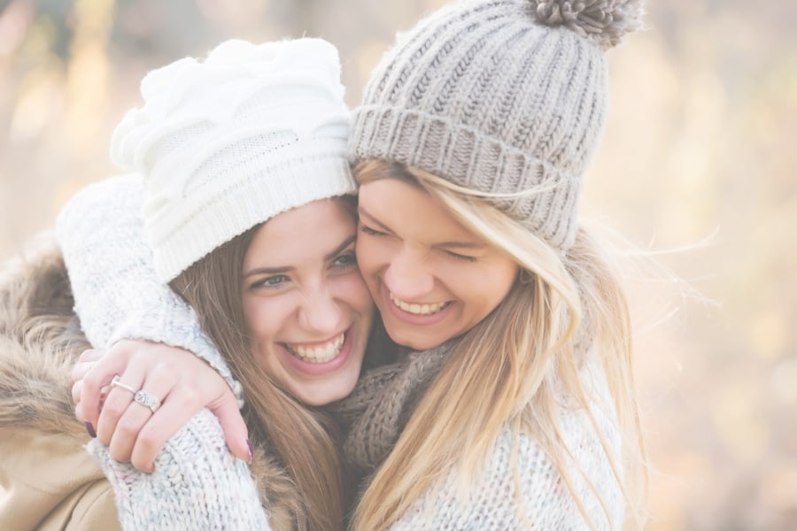 Two girls hugging