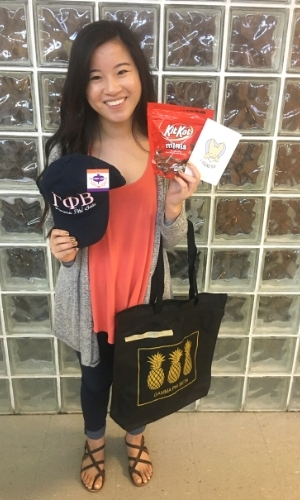 Juliet Meiling of JulietMeiling.com back in 2016 picking up one of her gift baskets during sorority Big Little Reveal Week.