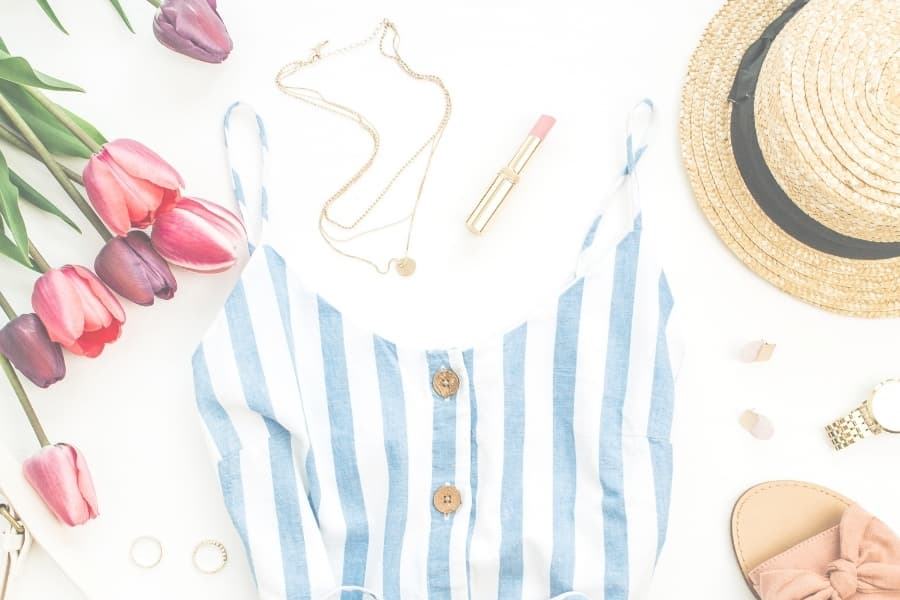 Flat lay of summer fashion items for women