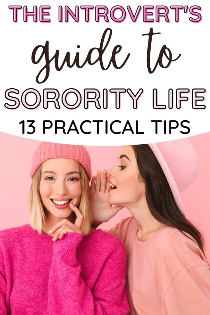 A blonde and brunette wearing pink and sharing secrets with one another. The brunette girl is whispering something in the blonde girl's ear. The text overlay says, "The Introvert's Guide to Sorority Life 13 Practical Tips."